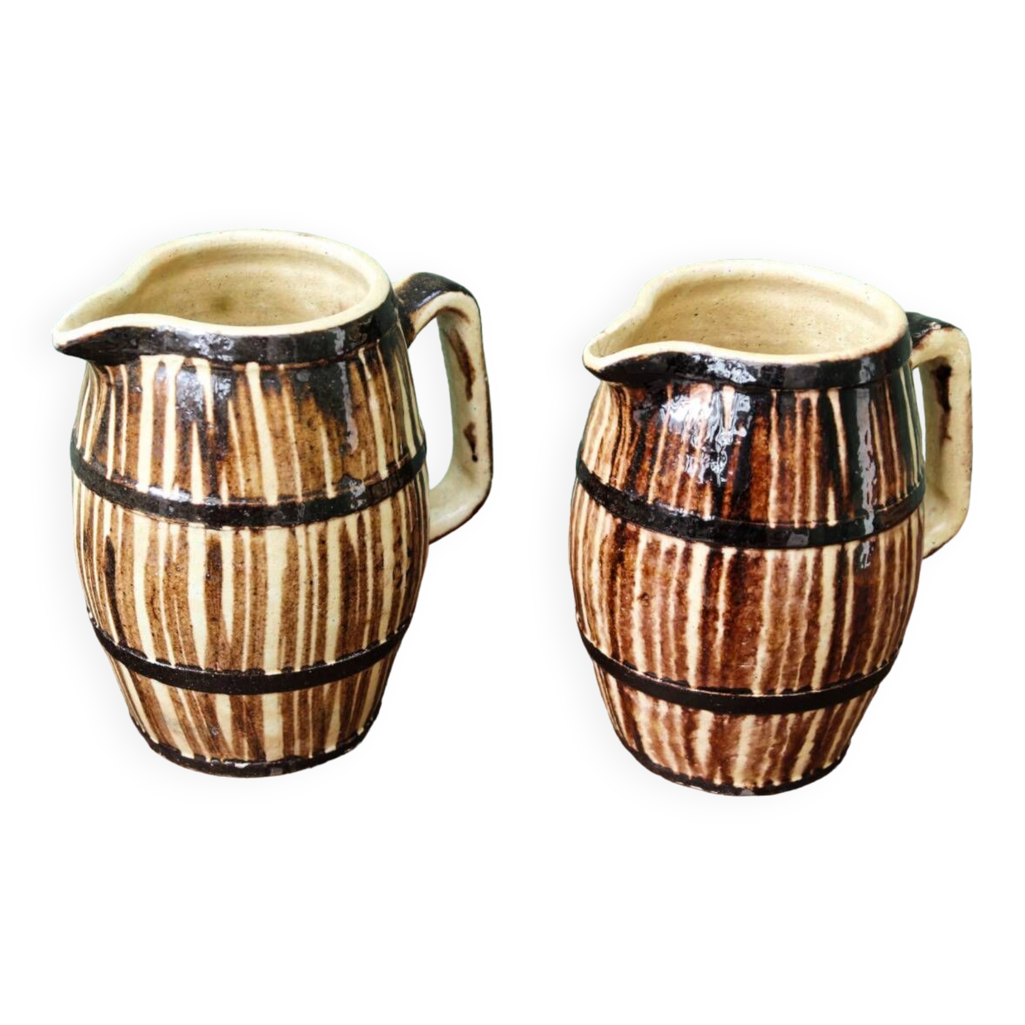 Pair of trompe l'oeil bistro pitchers, barrels