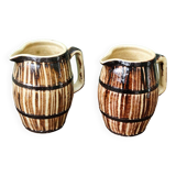 Pair of trompe l'oeil bistro pitchers, barrels