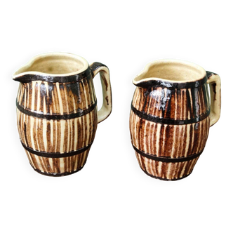 Pair of trompe l'oeil bistro pitchers, barrels