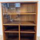 Teak bookshelf, sliding display + open storage, 60s/70s