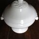 Antique soup tureen, white earthenware, with stopper decoration.