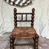 Turned wooden chair by Charles Dudouyt