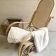 Rocking chair with a cane seat and backrest.