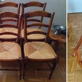 Set of 6 solid wood chairs with high-quality straw seats.