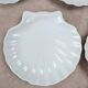 Set of 8 scallop shell plates