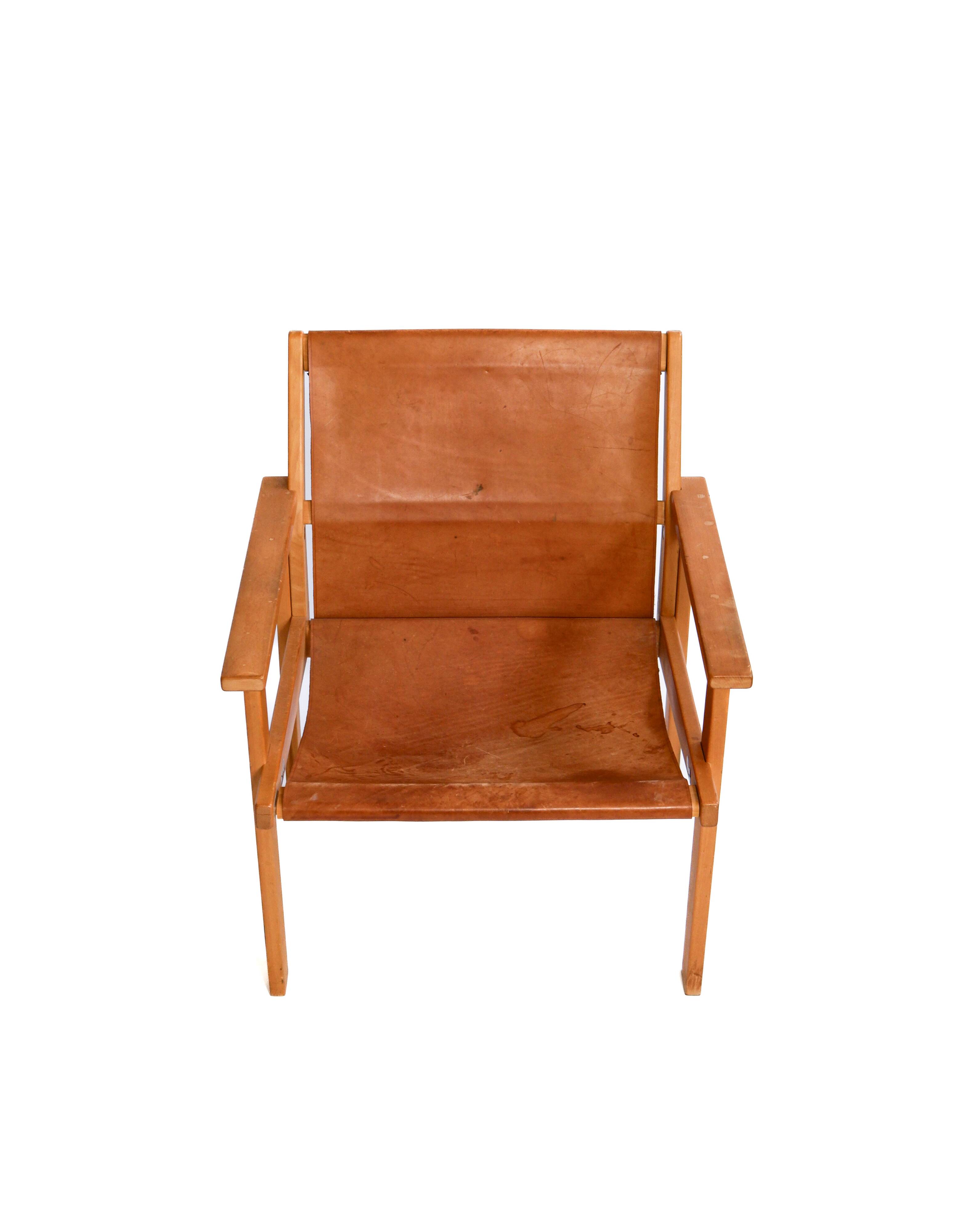 Rare Hans Agne Jakobsson armchair in leather and wood. Circa 1970