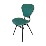 Chair in curved wood covered with vinyl, metal tube.