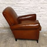 Restored horsehair club chair with curved back