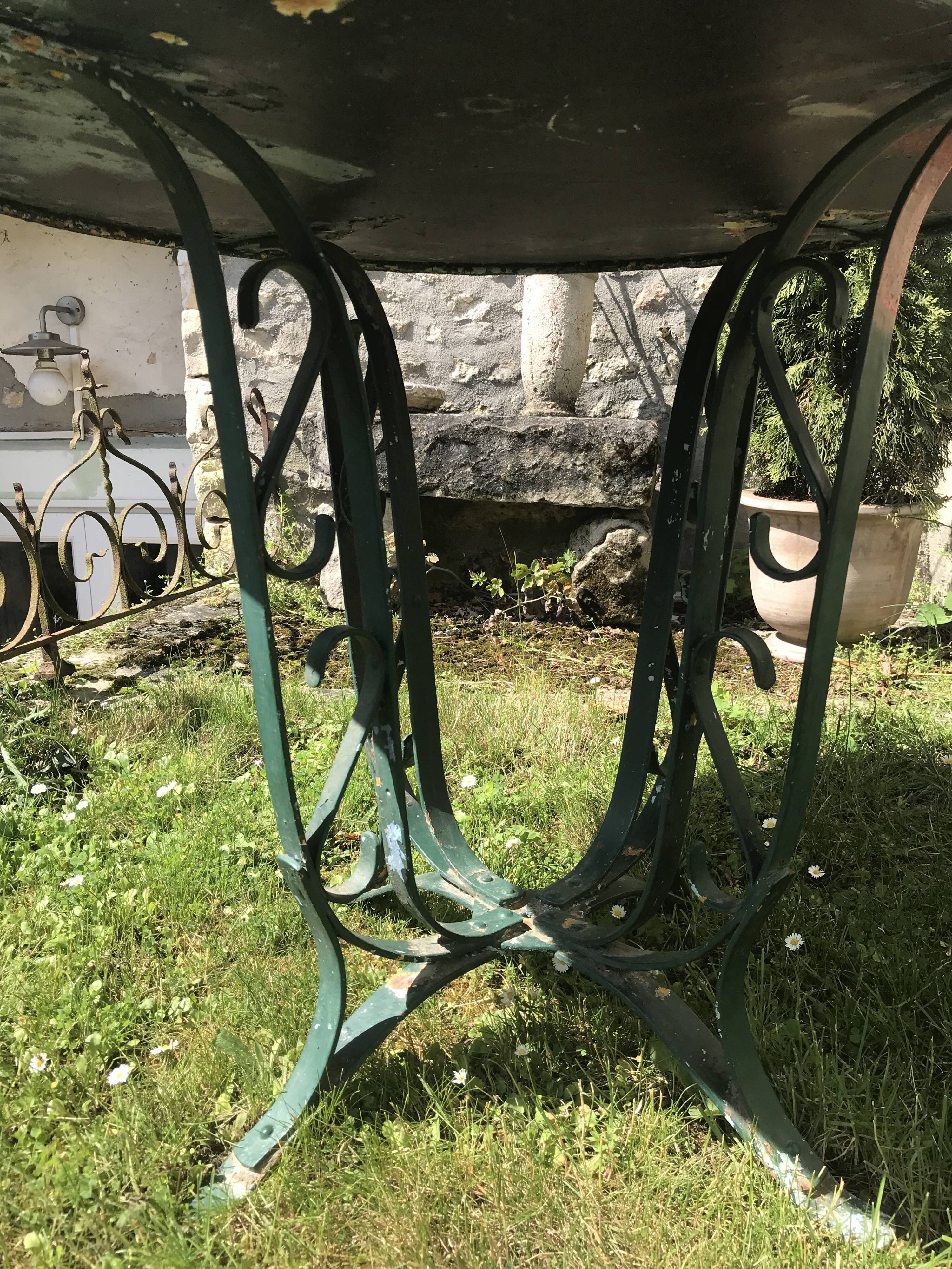 large antique iron table riveted