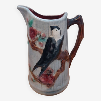 Saint Clement slip pitcher, early 20th century.