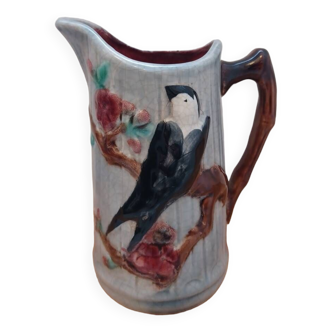 Saint Clement slip pitcher, early 20th century.