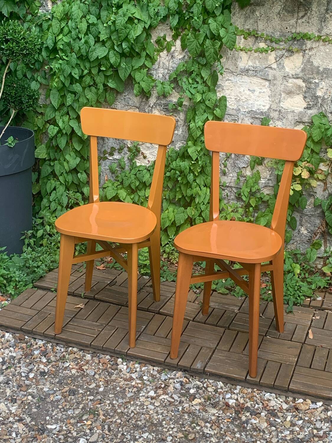 Pair of caramel bistro chairs 1950
