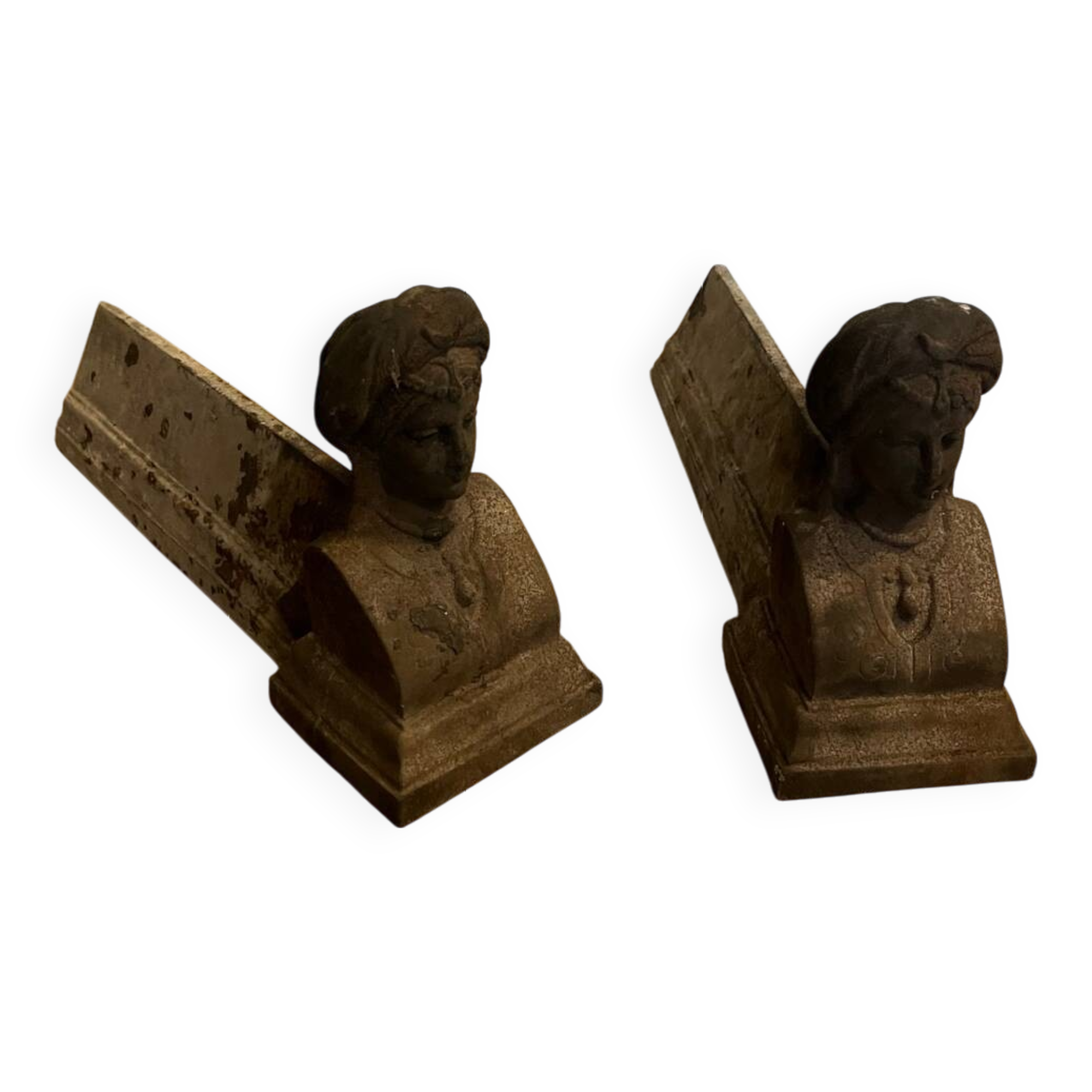 Pair of cast iron andirons with face