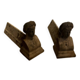 Pair of cast iron andirons with face
