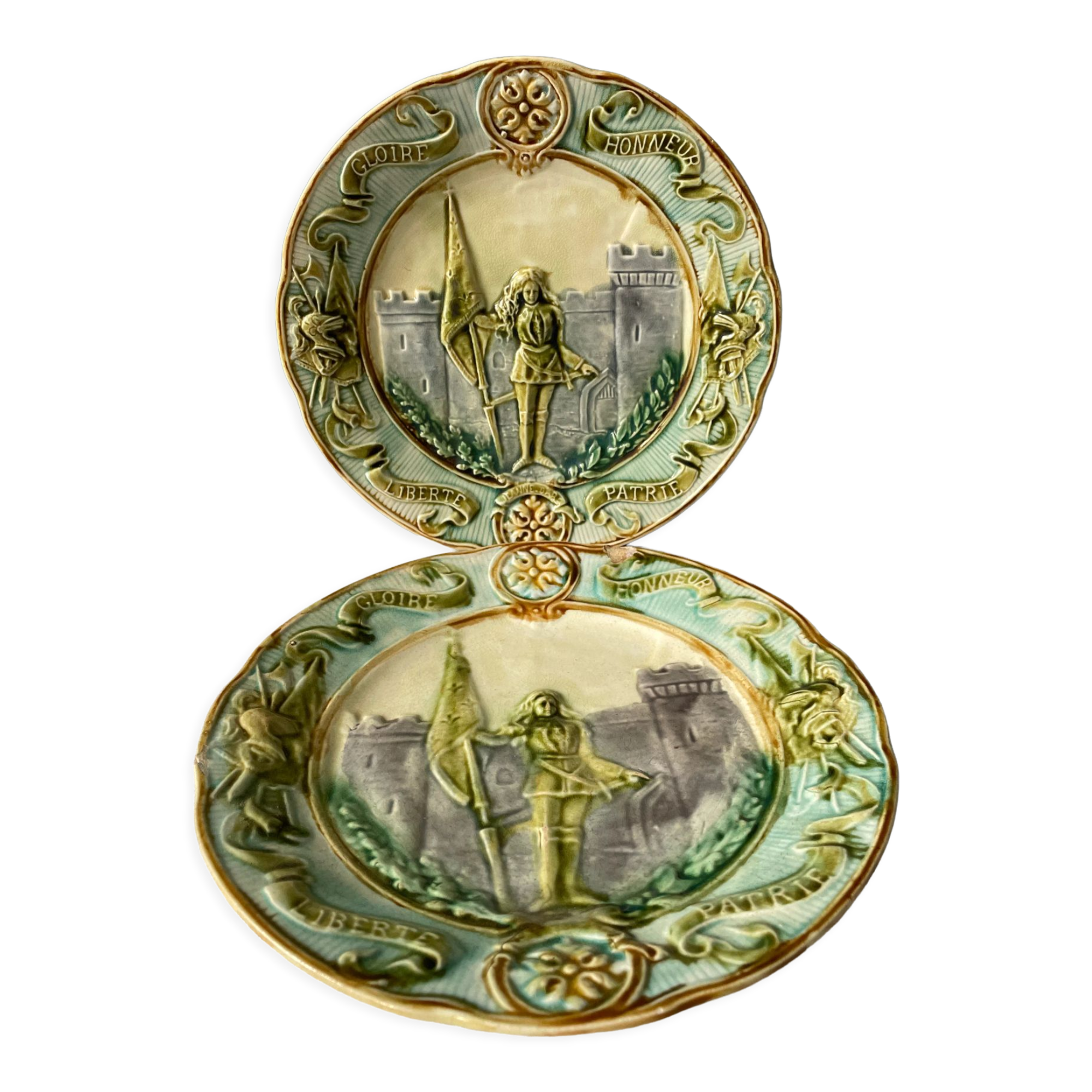 Set of two plates late nineteenth in slip Jeanne d'Arc