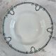 Set of 7 deep plates in earthenware, decorated with a green frieze.