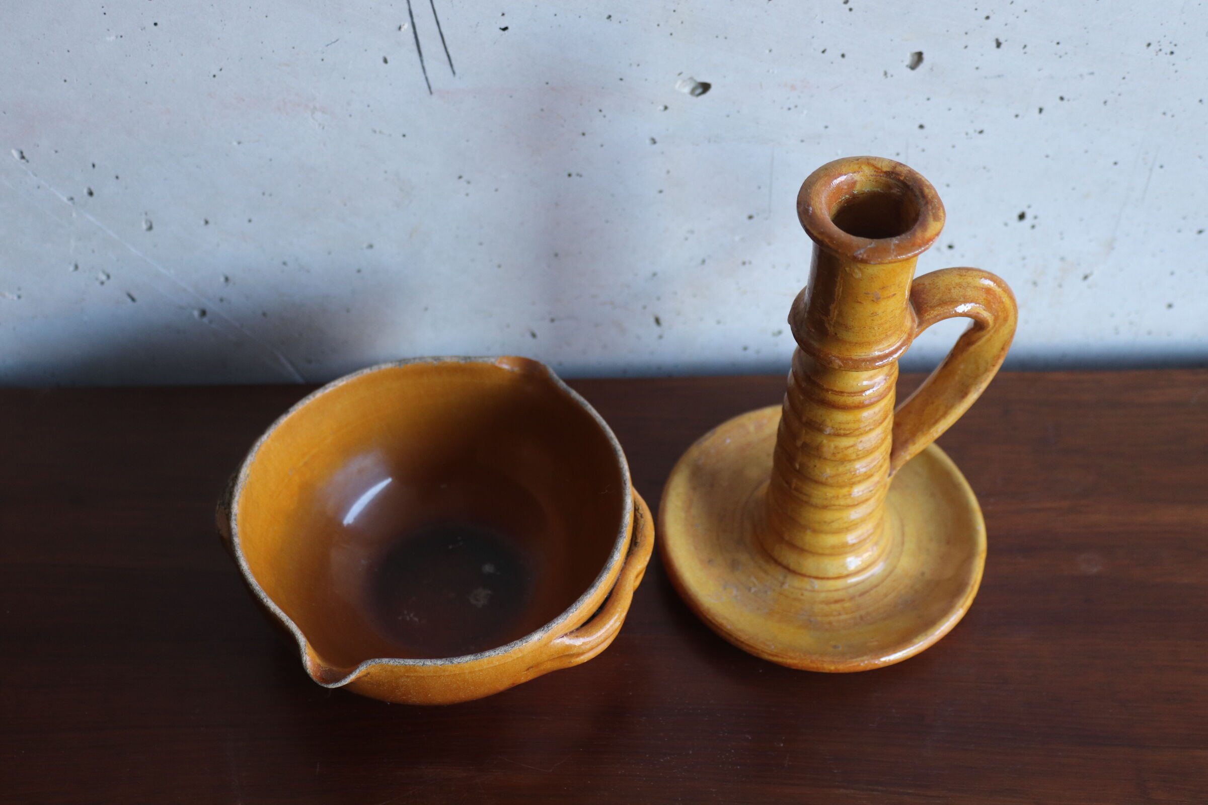 Candle holder and empty pocket in old yellow ceramic