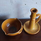 Candle holder and empty pocket in old yellow ceramic
