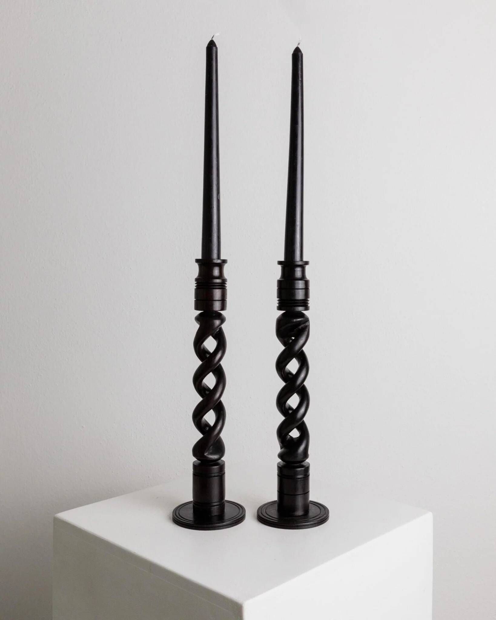Set of 2 vintage dark wood candlesticks, twisted design, Italy, 1970s.