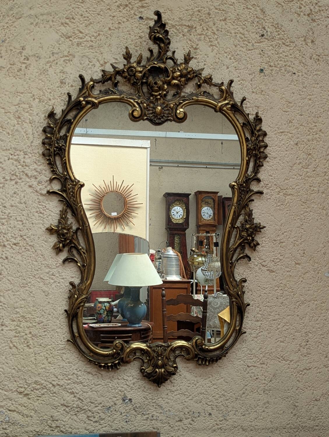 Gold metal wall mirror
