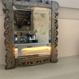 Eventful beveled mirror and openwork period 1900 repelled tin decoration