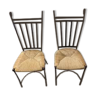 2 iron and straw chairs