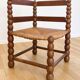Beaded wood corner chair