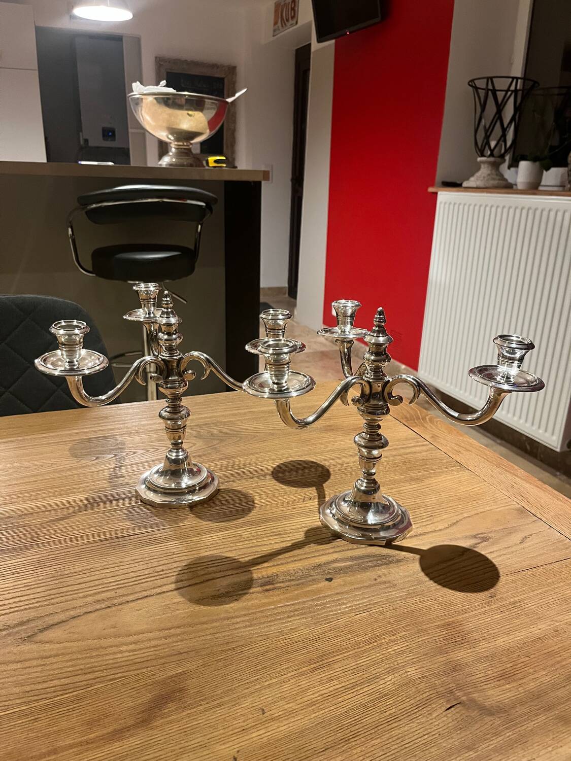 Pair of candelabra, three silver-plated metal lights