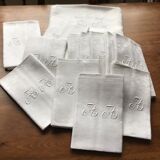 Tablecloth and 12 linen towels marked AA