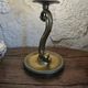 Table lamp with brass fish and draped glass tulip.