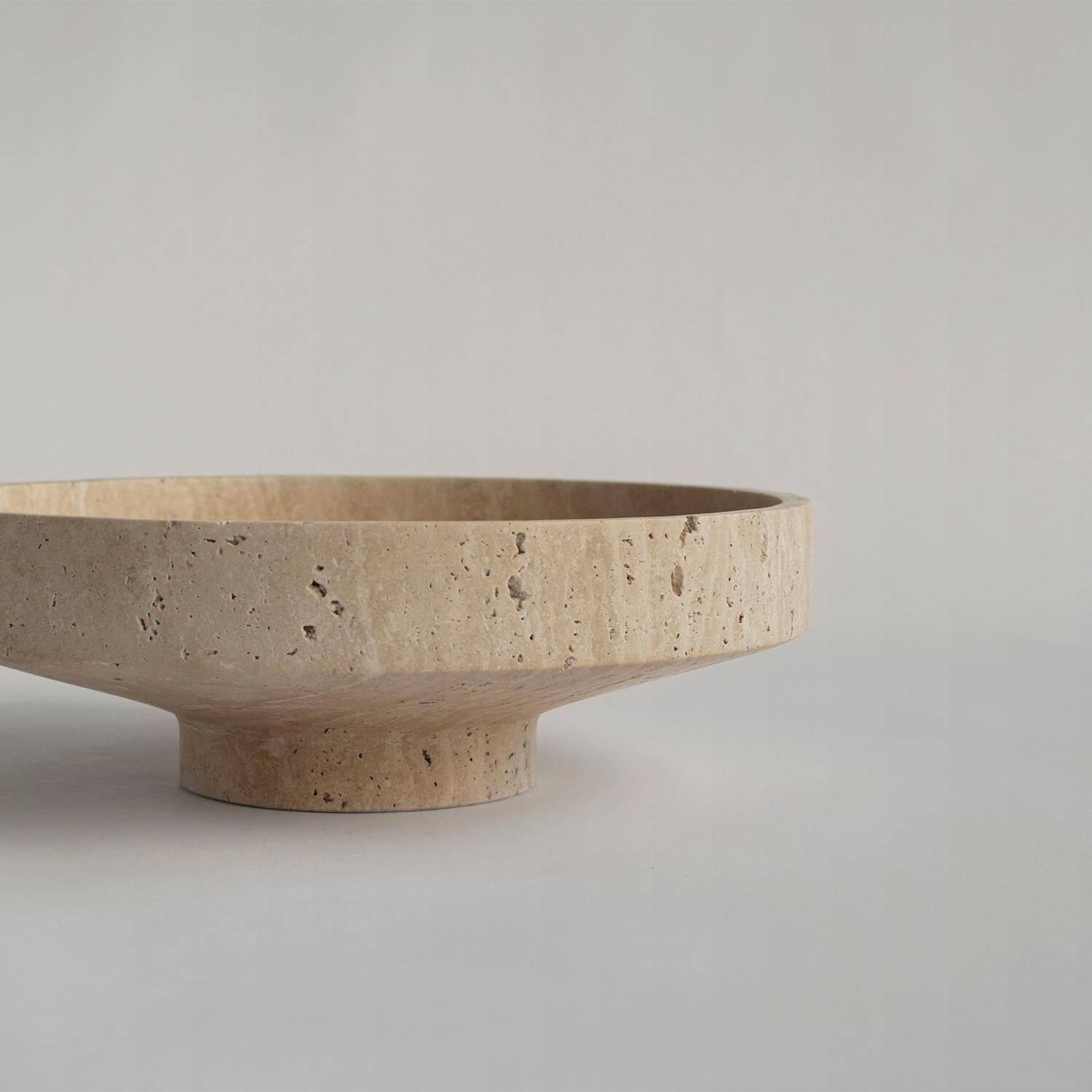 Narrow bowl in travertine