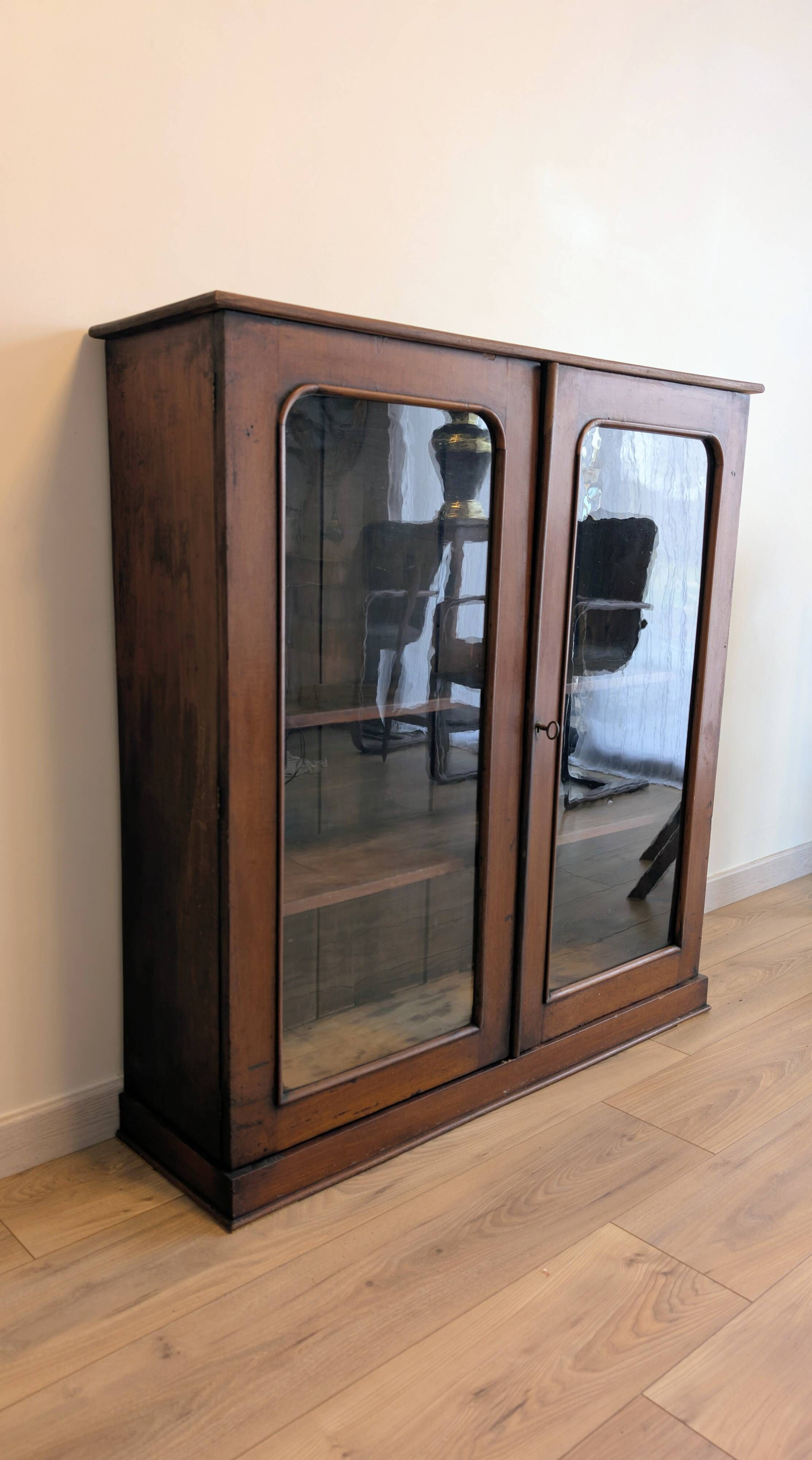 Victorian English mahogany display cabinet, elegant showcase furniture.