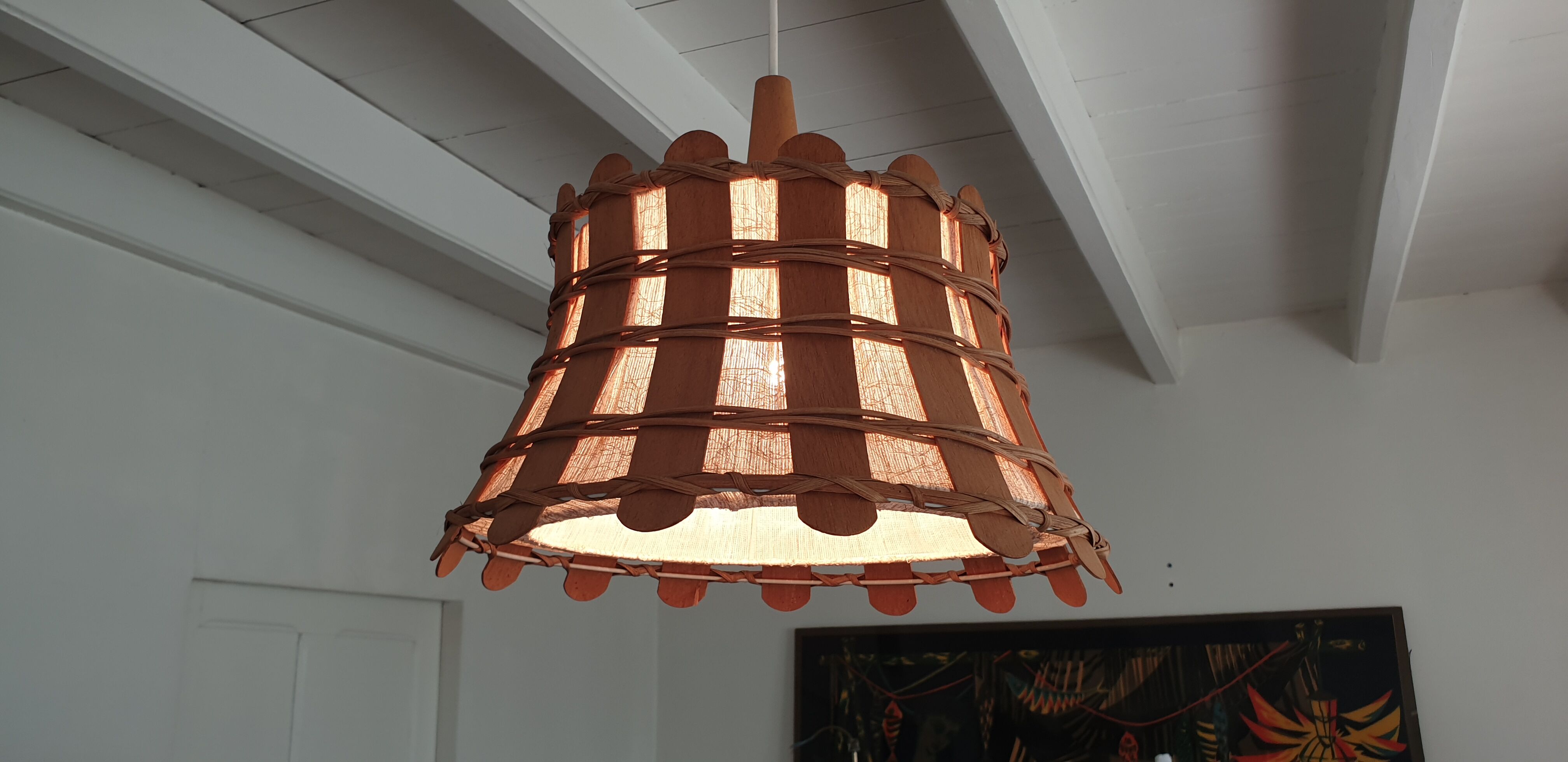 Rattan and wood suspension