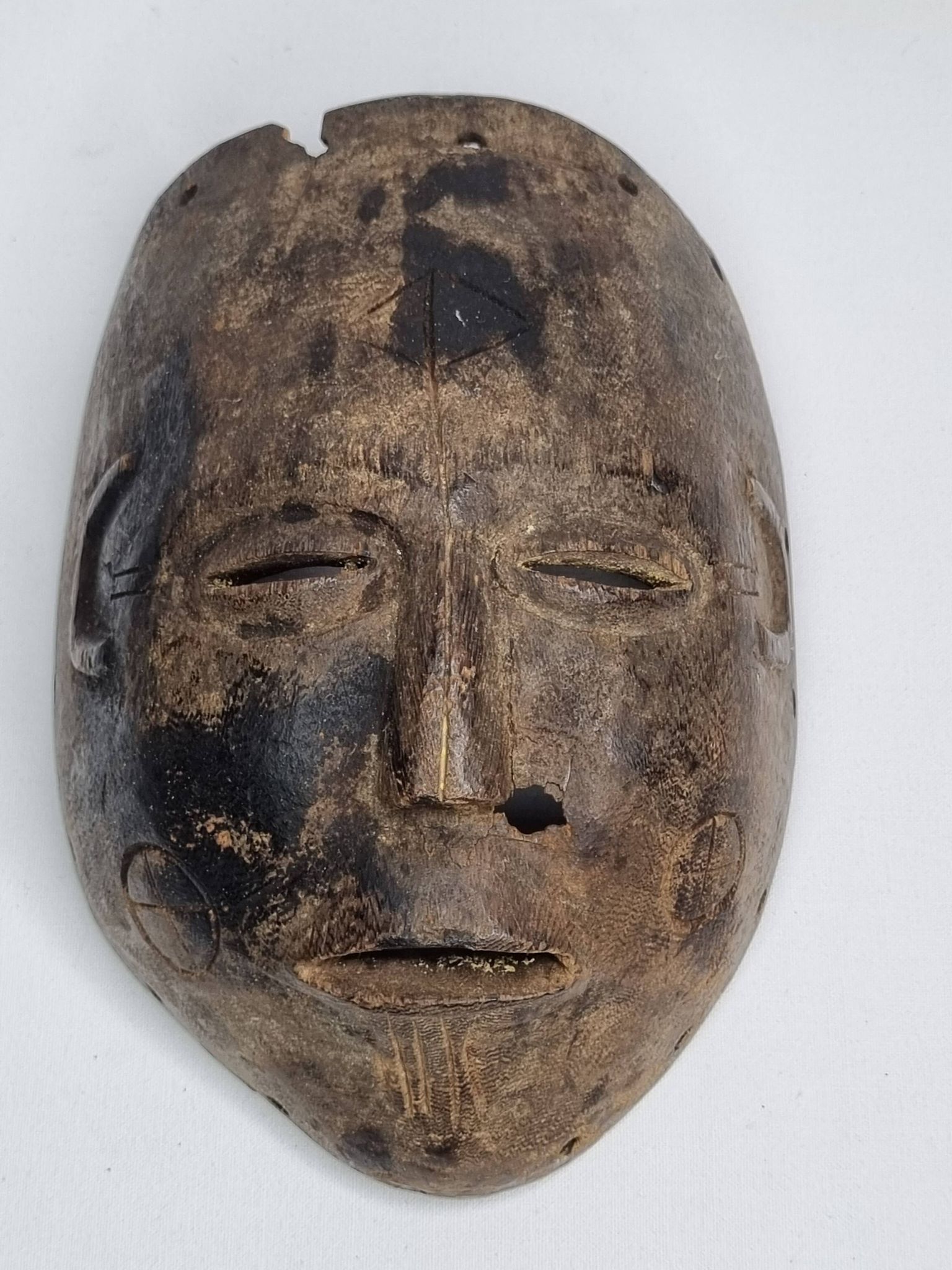 Antique carved wooden tribal mask, early-mid 20th century