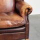 Comfortable cowhide wingback armchair in English style