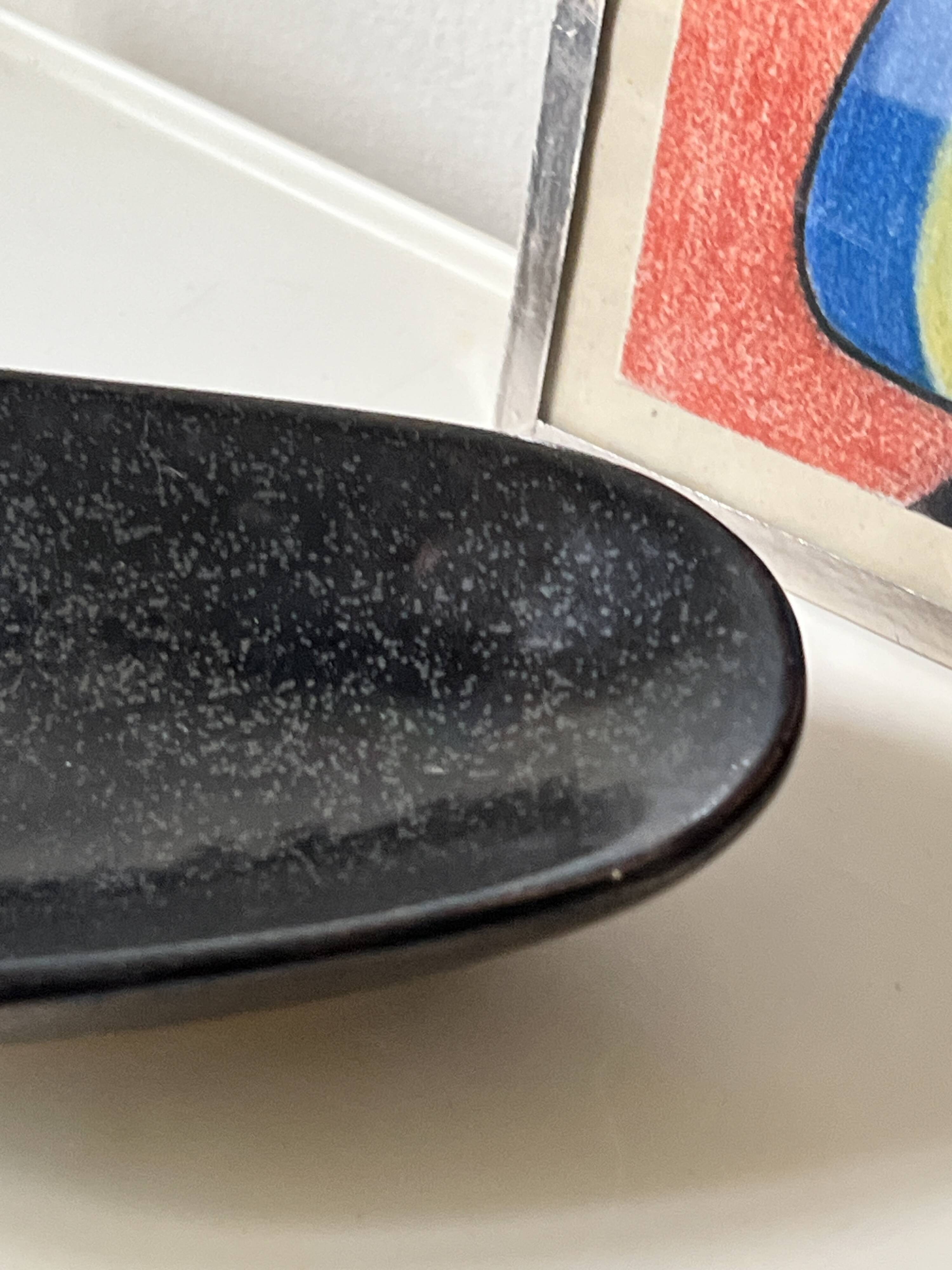 Black glazed ceramic catchall, 1950s design