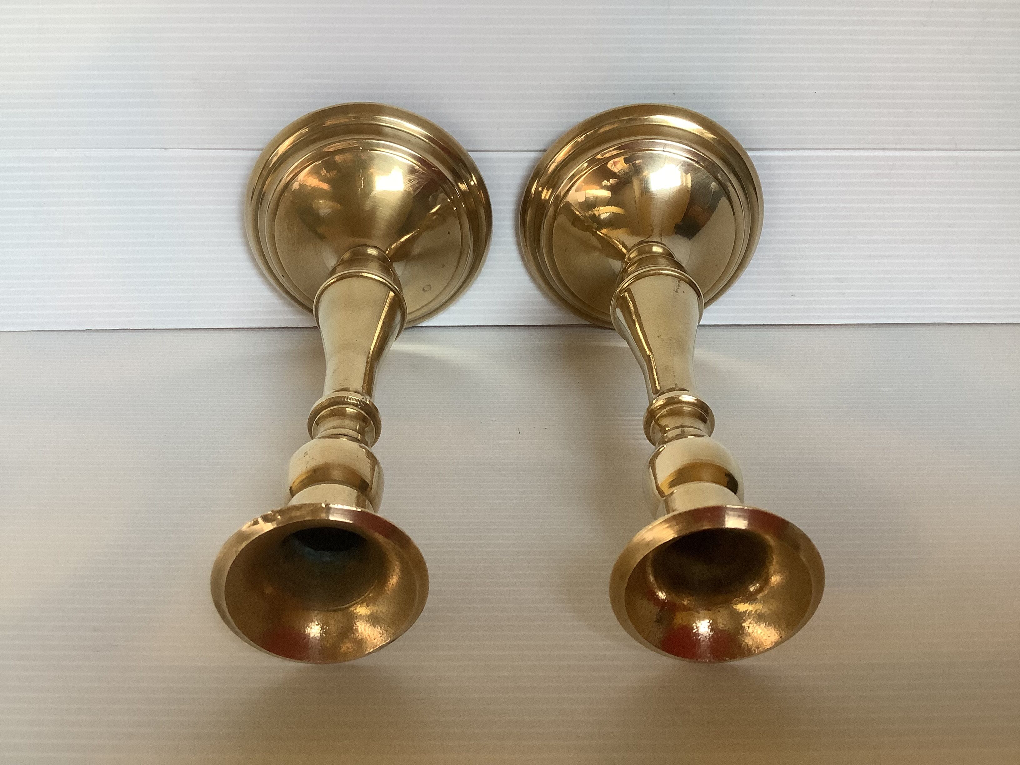 Pair of brass candle holders