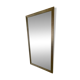 Textured embossed metal wall mirror with bevelled mirror.