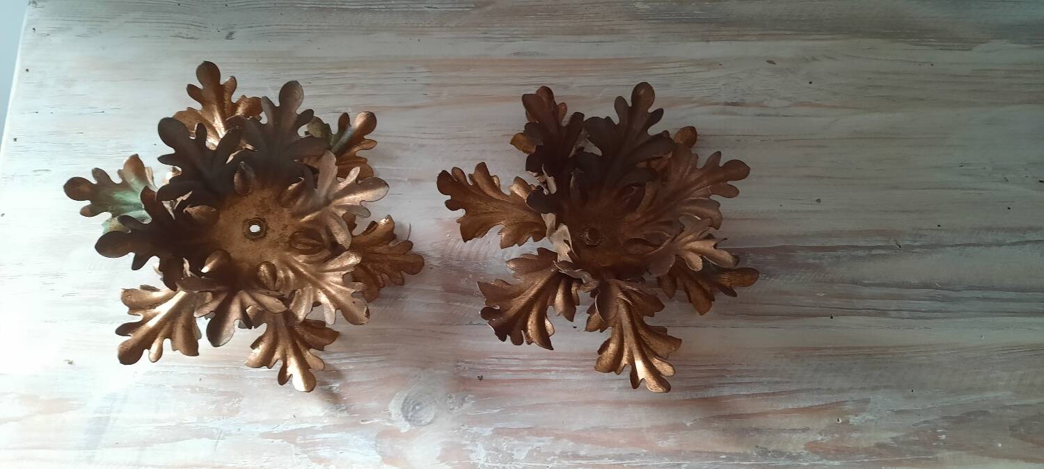 Pairs of golden foliage-style wall lights
