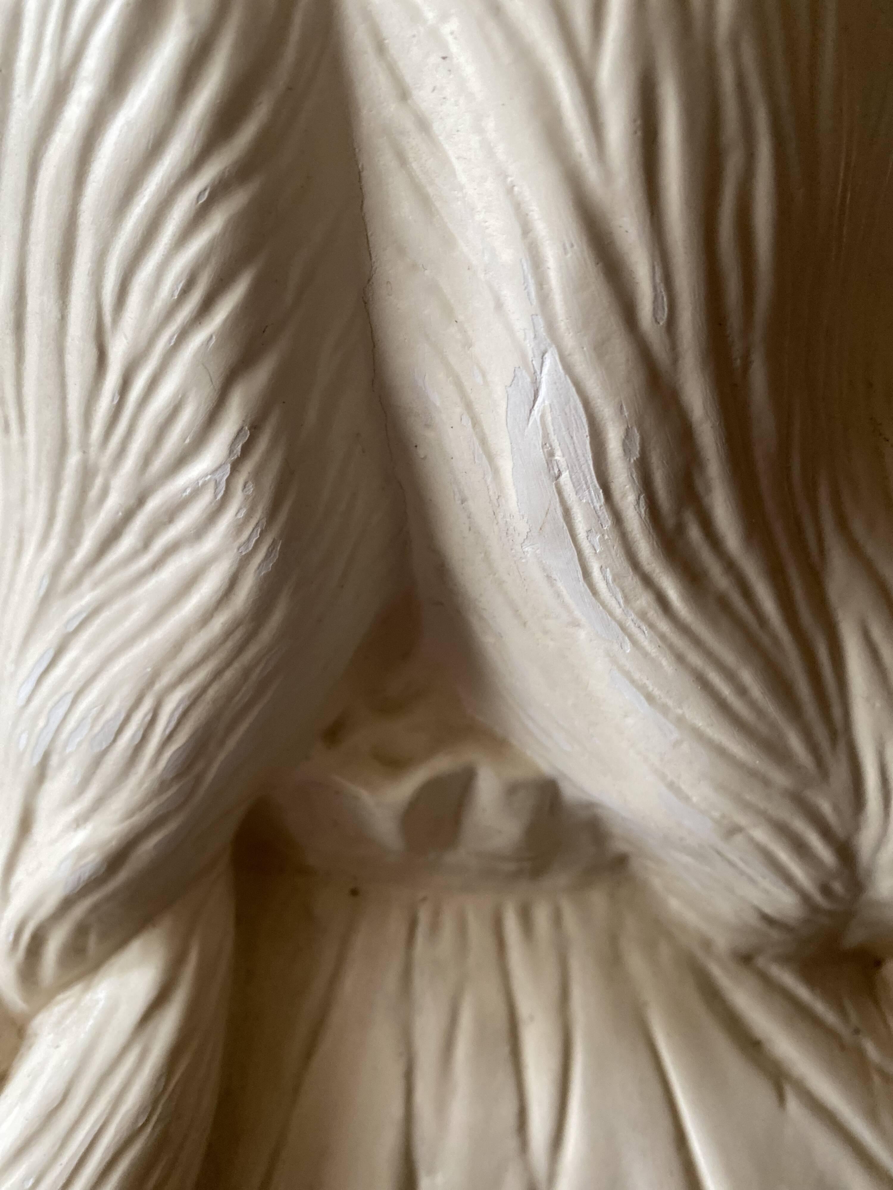 Bust of a young girl with long braids, Art Nouveau style