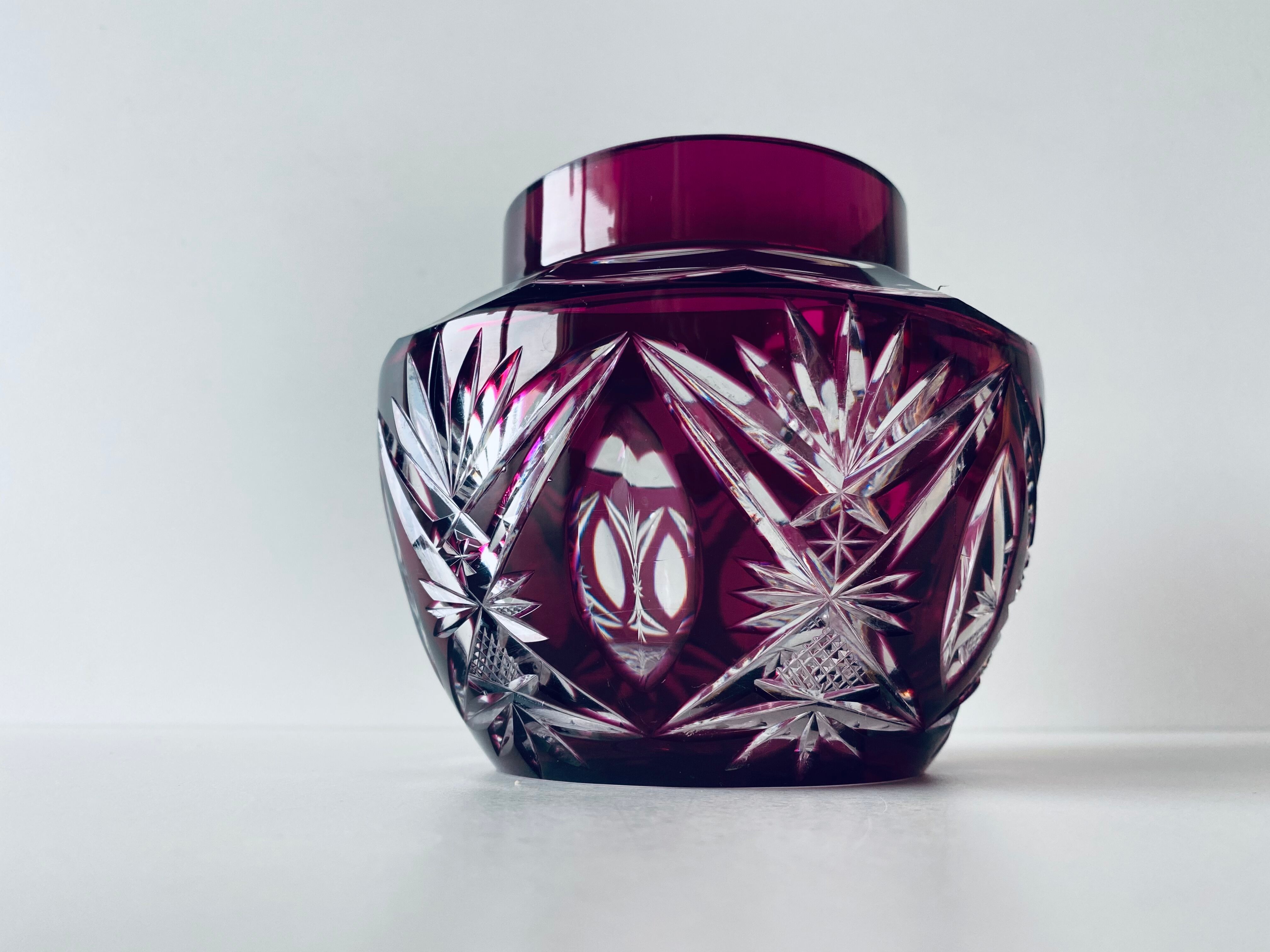 Ancient plum crystal vase