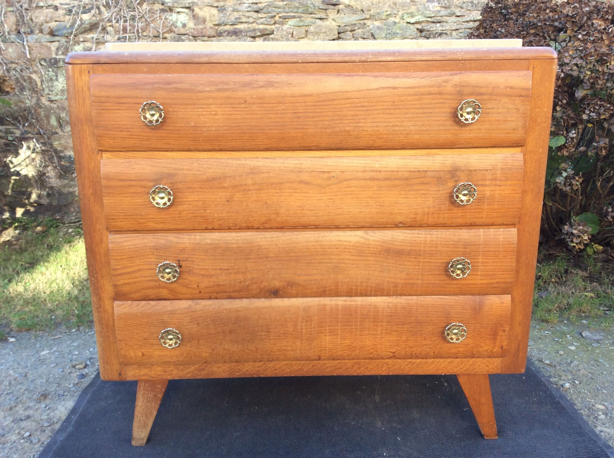 Vintage chest of drawers with oak compass base with marble top.