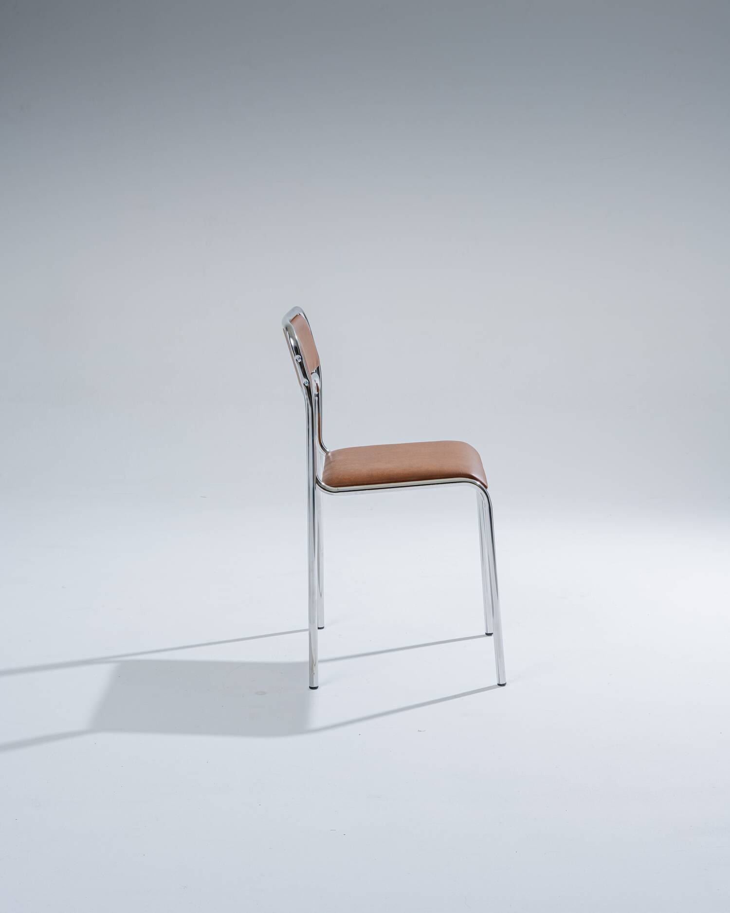 Tubular steel and cognac leatherette chair, 1980s