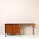 Scandinavian desk with bookcase and compartment with sliding doors
