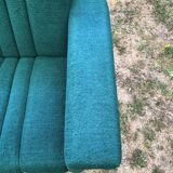 Duo of vintage armchairs with green fabrics.