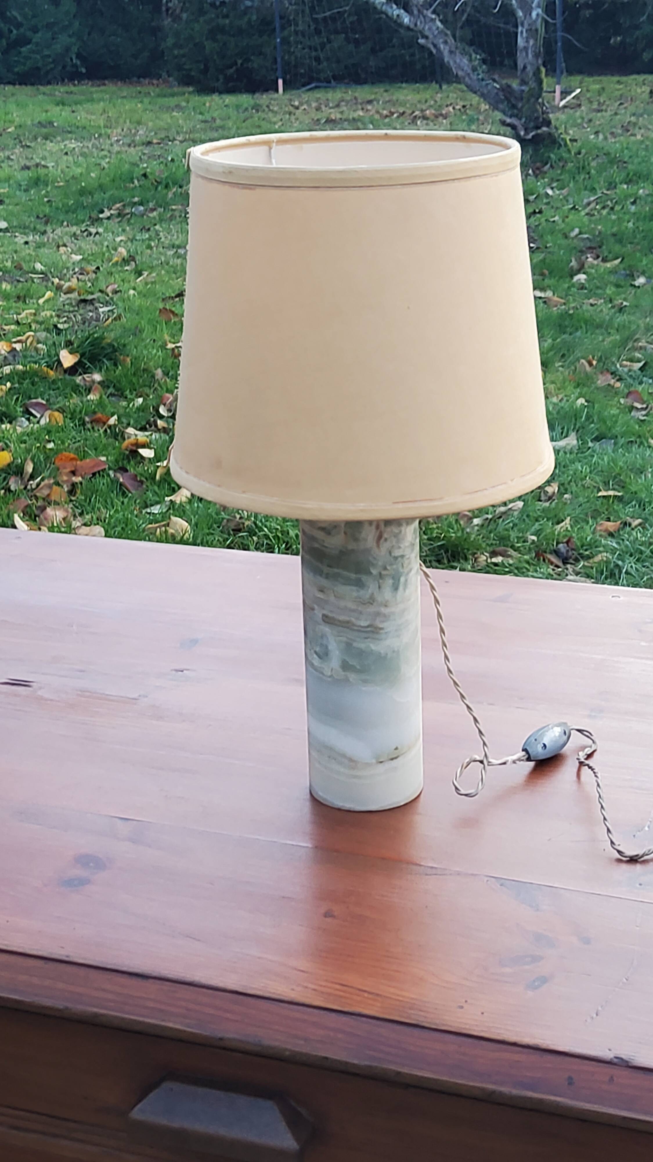 Designer lamp from the 70s in almond green onyx with original fabric shade