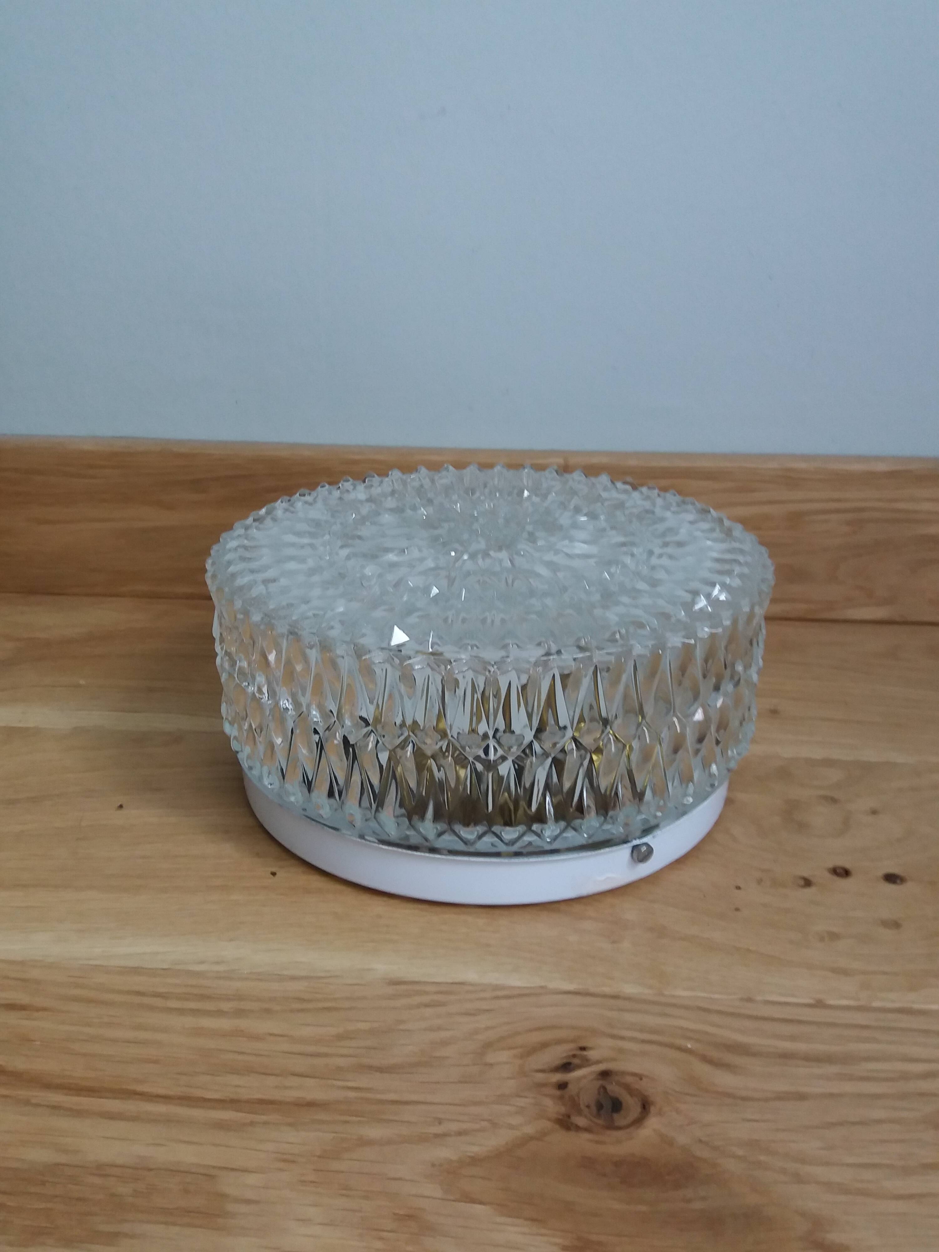 Globe ceiling light in molded glass