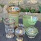 Set of 5 vases in green granite glass and vintage gold
