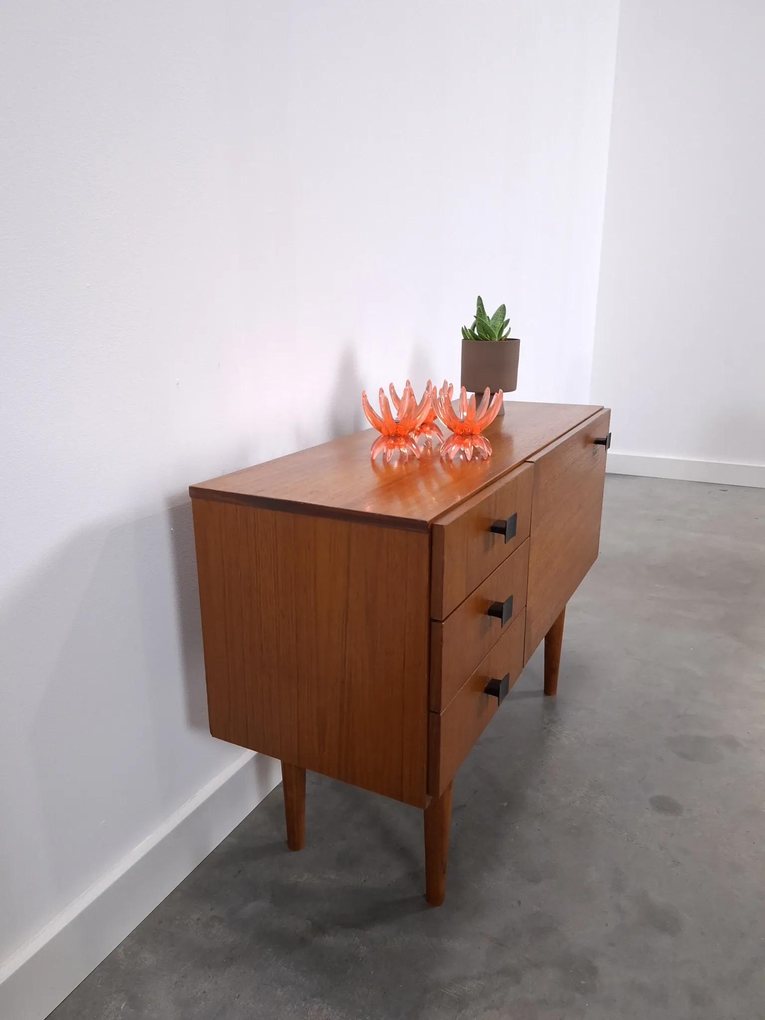 Vintage small teak cabinet with drawers, flap and black handles, hallway cabinet.