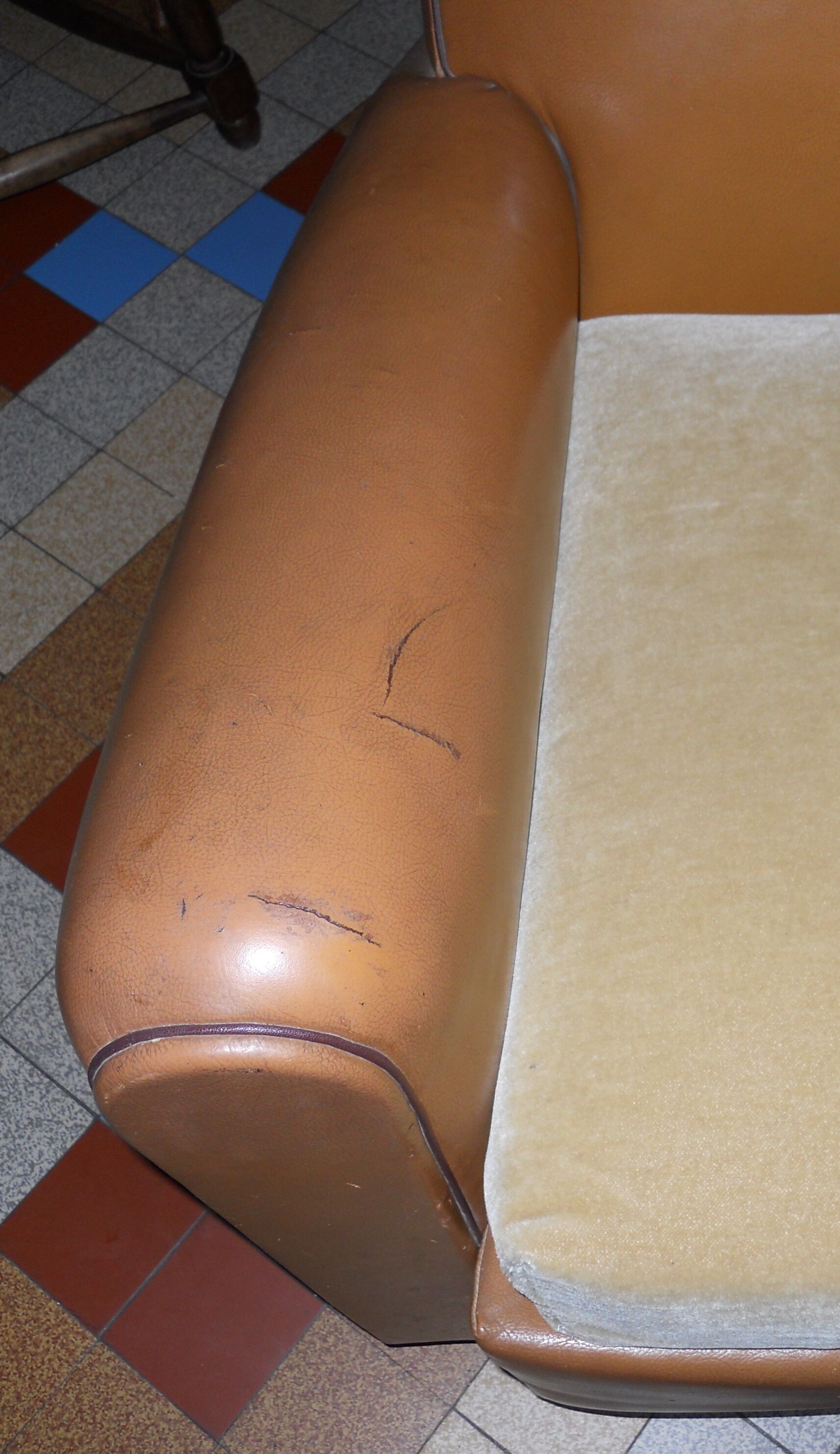 Brown leather club armchair
